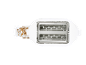 White toaster with crumb tray filled with crumbs, top view.
