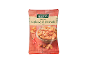 Bag of roasted cashews and peanuts with chili, on a wooden table
