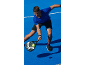 Man in blue t-shirt and black shorts playing padel on a blue court.