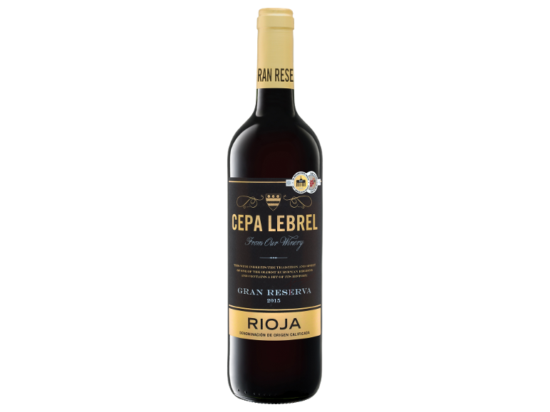 Bottle of red wine Gran Reserva Rioja 2015 with a gold and black label.