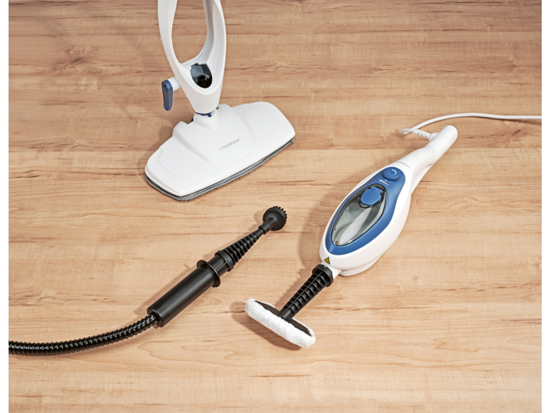 Steam mop and handheld steam cleaner with attachments on a wooden floor.