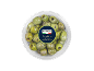 Nocellara green olives with rosemary and thyme in a plastic container.