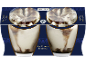 Tiramisu ice cream with cocoa, presented in a dark blue and gold packaging.