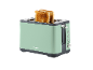 Mint green toaster with two slices of toasted bread.