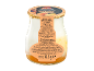 Creamy yogurt dessert with Murcian peach in a glass jar.