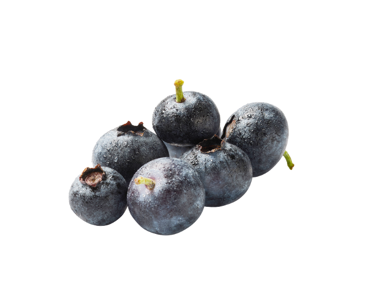 Fresh blueberries with water droplets on a black background.