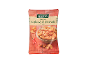 Bag of roasted cashews and peanuts with chili, on a wooden table