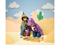 Kids in dinosaur and unicorn hoodies explore a pirate map in a desert landscape.