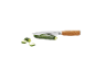 Kitchen knife with a wooden handle slicing a green zucchini.