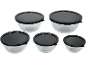 Set of five clear food storage bowls with black lids.