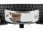 Close-up of a black ceramic kamado grill with a stainless steel air vent