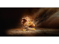 Two golden croissants, one broken, with crumbs and butter floating.