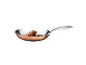 Copper pan with beef fillet and herbs.