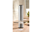 Stainless steel electric salt or pepper mill on a kitchen countertop.