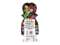 Colorful chocolate dragees in transparent packaging with nutritional information and ingredients.