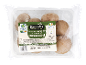 A clear plastic tray of vitamin D enriched Irish chestnut mushrooms with a green and white label.