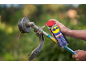 Multipurpose spray being applied to a string trimmer head outdoors.