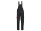 Black work overalls with red details and multiple pockets.