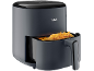 Dark grey air fryer with a basket full of golden french fries.