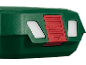 Detail of a green casing with a red sliding button and white indicators.