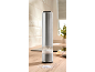 Stainless steel electric salt or pepper mill on a kitchen countertop.