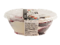 A clear plastic tub of vanilla and forest fruits ice cream with chocolate pieces.