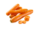 Fresh whole and sliced carrots on a black background.