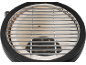Top-down view of a ceramic grill with a stainless steel cooking grate.
