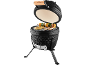 Black ceramic barbecue with open lid, grilling sausages, chicken, and vegetable skewers.