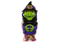 Halloween witch-shaped candy dispenser in green and purple.