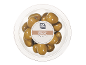 Gordal olives with pits in a clear container, with label