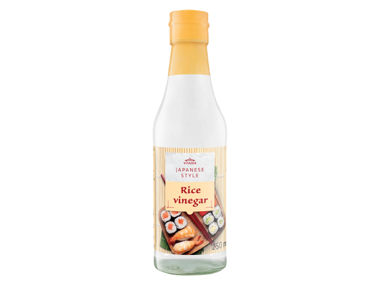 Japanese style rice vinegar in a bottle with sushi