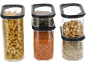 Food containers with pasta, lentils, pumpkin seeds, hazelnuts, and oats.