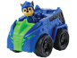 Blue and green toy car with a brown puppy in a blue helmet.