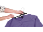 Hands hanging a purple cardigan on a black hanger.
