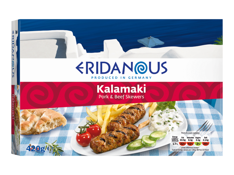 Kalamaki pork and beef skewers with fries and tzatziki, against a Greek island backdrop.