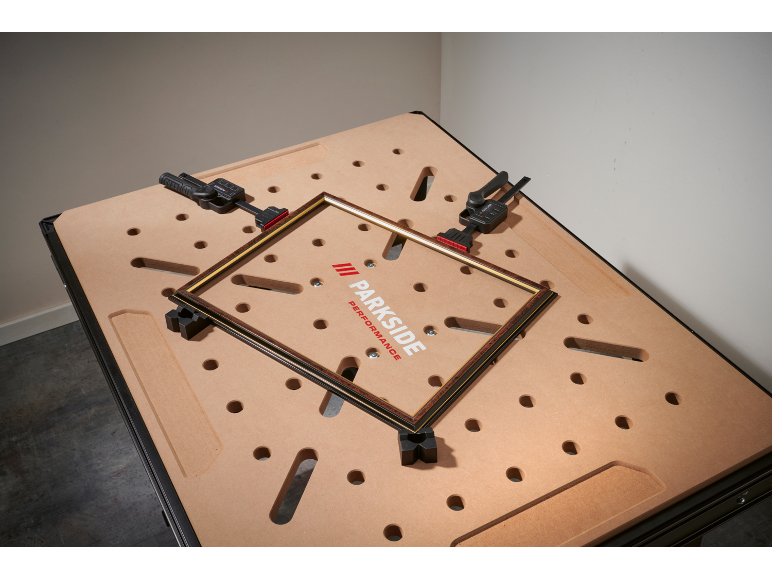 Workbench with clamps and a picture frame
