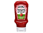 Red tomato ketchup with a label featuring pickled cucumber flavor.