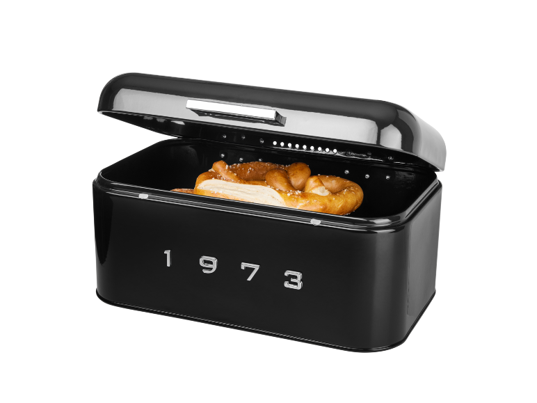 Black retro-style bread bin with a pretzel, displaying the year « 1973 ».