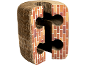 Corrugated cardboard cat scratcher in the shape of a chimney with holes.