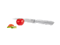Kitchen knife slicing a tomato, with herbs and spring onion alongside.
