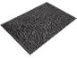 Gray loop-textured bath mat on a black background.