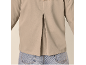 Back view of a beige short-sleeved top with a pleat, worn over blue jeans.