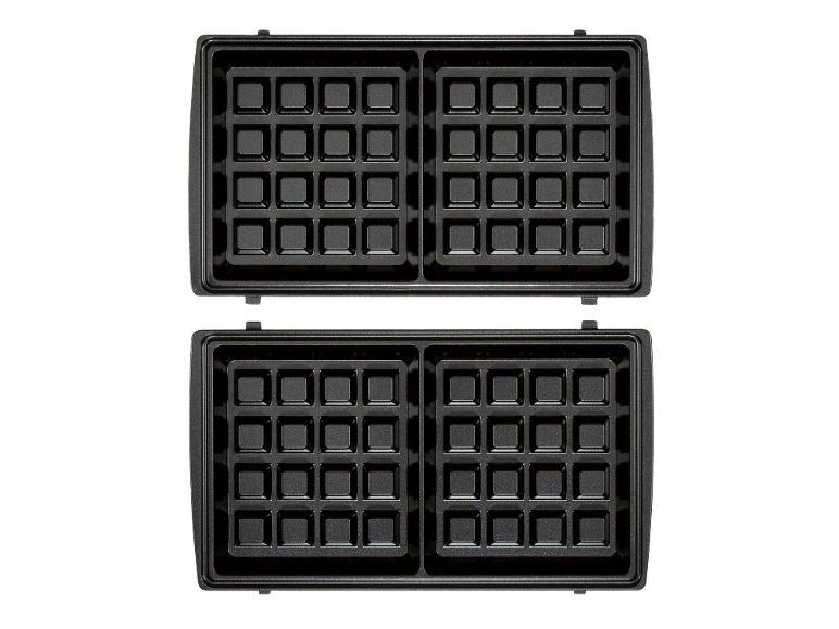 Open waffle maker with four rectangular baking plates.