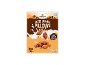 Salted Caramel Pillows cereal box with milk splash, showing nutritional information and Fairtrade logo.