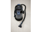 Carpet cleaner with black hose and nozzle on a light carpet