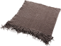 Brown throw blanket with fringe, folded on a black background.