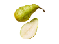 Whole green pear and half a pear with water droplets on a black background.