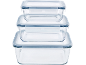 Three stacked glass food containers with clear plastic lids and blue seals.