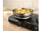 Pan with rice and shrimp on a double electric hot plate